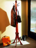 Selection of manufactured coat racks and coat trees .